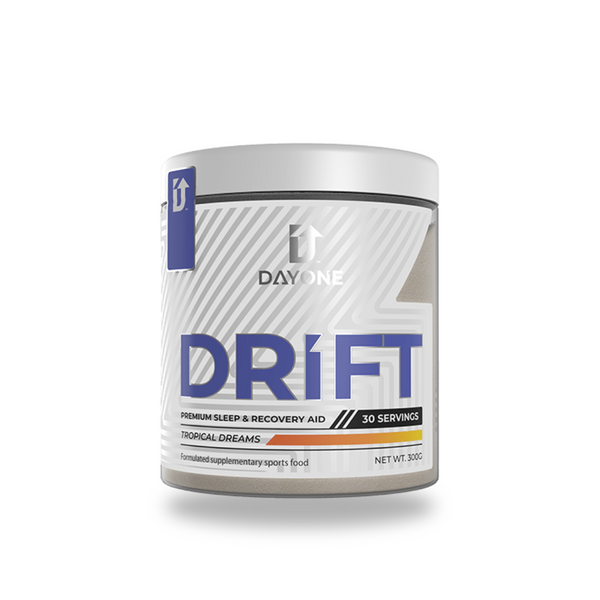 Day One Drift sleep and recovery aid supplement in tropical dreams flavor, available in a 30-serving container, designed to support restful sleep and muscle recovery.
